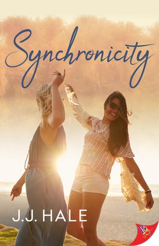 Two women, one brunette facing the camera, the other blonde facing away walk along the beach at sunset. The title Synchronicity is written in blue text at the top and the author J.J. Hale is in white text at the bottom.